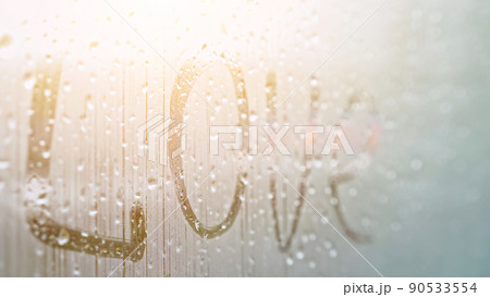 word Love on window covered with fog 90533554