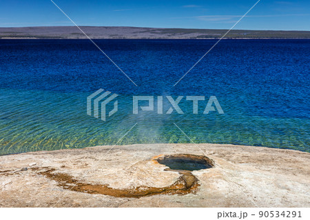 Landscape of geyser basin near West Thumb lake of Yellowstone. 90534291