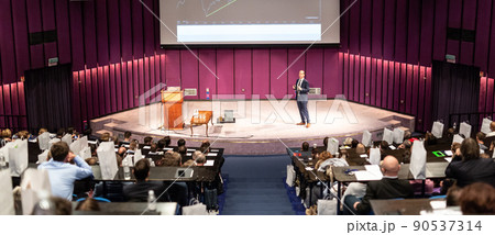 Speaker giving presentation on business conference event. 90537314