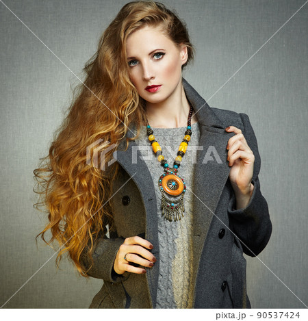 Portrait of young woman in autumn coat Portrait of young woman in autumn coat 90537424
