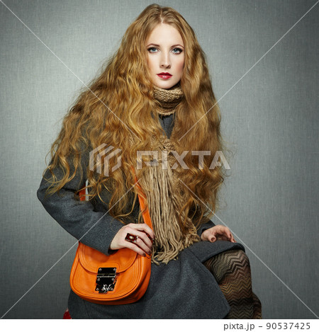 Portrait of young woman in autumn coat Portrait of young woman in autumn coat 90537425