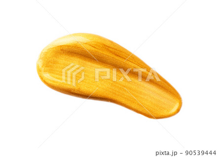 Abstract golden glitter beauty smear isolated on white background. Cosmetic or paint product. Abstract golden glitter beauty smear isolated on white background. Cosmetic or paint product. 90539444