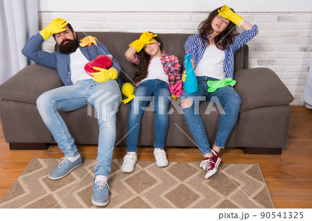 Cleaning all day exhausting occupation. Tired parents and kid. Cleaning all day exhausting occupation. Tired parents and kid. 90541325