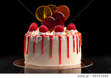 Raspberry cream mousse cake no baked cheesecake on black background Raspberry cream mousse cake no baked cheesecake on black background 90541988