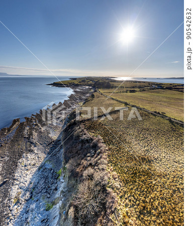 Aerial view of the amazing rocky coast at Ballyederland by St Johns Point in County Donegal - Ireland. 90542632