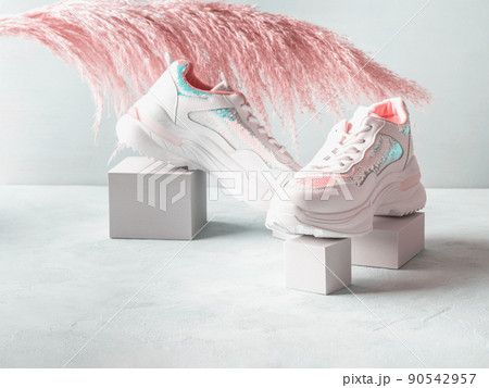 White pastel sneakers with sequins on geometric podiums with pampas 90542957