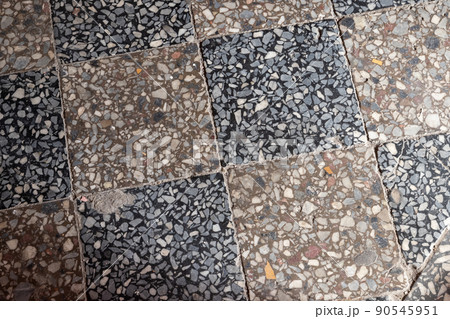 Old damaged tiling on the floor, retro style 90545951