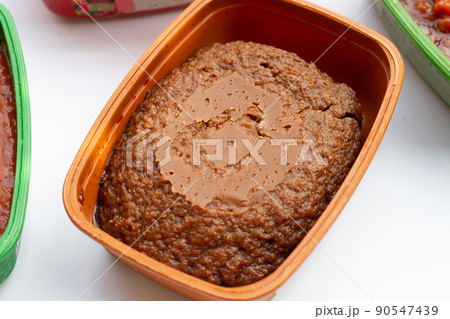 Korean chili paste on white background. Korean chili paste on white background. 90547439