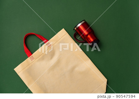 Textile shopping bag and coffee cup flat lay 90547594