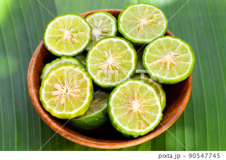 Bergamot kaffir lime in wooden bowl 90547745