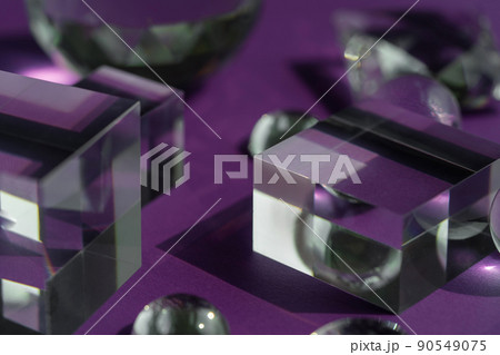 Crystal prism refracting light, magic crystals and pyramid, sphere and cube on purple background. Spiritual healing crystal practice. Feng Shui, good energy flow concept background.. 90549075