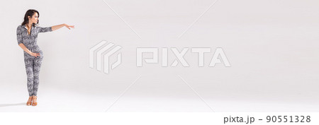 Banner latin dance bachata lady, jazz modern and vogue dance concept - Beautiful young woman dancing on white background with copy space Banner latin dance bachata lady, jazz modern and vogue dance concept - Beautiful young woman dancing on white background with copy space 90551328