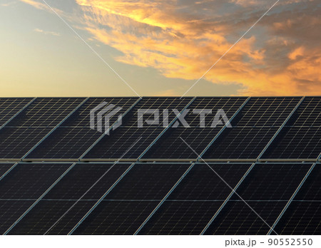 Solar panel on beautiful orange sundown background.. Alternative energy concept, copy space. Solar panel on beautiful orange sundown background.. Alternative energy concept, copy space. 90552550