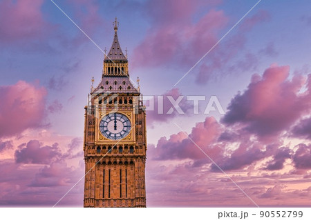 Big Ben, London, UK. A view of the popular London landmark, the clock tower known as Big Ben against a pink and cloudy sky. Special art filter 90552799