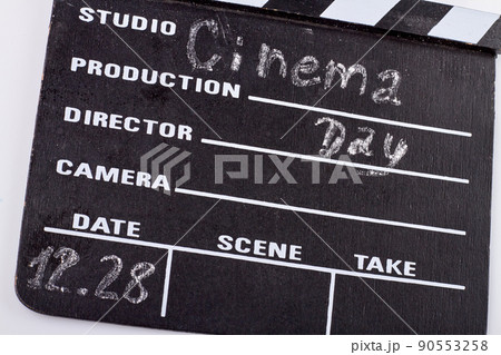 28 december world cinema day. Close-up cinema clapperboard. 90553258