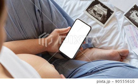 Pregnancy device mockups. Mobile pregnancy online maternity application. Pregnant mother using phone mock up. Pregnancy, medicine, pharmaceutics, health care and people concept. Pregnancy device mockups. Mobile pregnancy online maternity application. Pregnant mother using phone mock up. Pregnancy, medicine, pharmaceutics, health care and people concept. 90555610