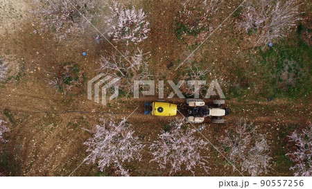 agricultural spraying tractor drone shot 90557256