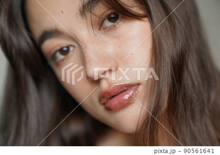 そばかすメイクの女性の写真素材