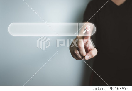 Search engine optimization SEO, Concept of search technology on the Internet, hand using search bar on the website.; 90563952