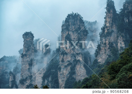 Amazing landscape of mountain and forest in the foggy at Wulingyuan, Hunan, China. Wulingyuan Scenic and Historic Interest Area which was designated a UNESCO World Heritage Site in China 90568208
