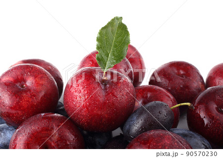 Blue and red plums background 90570230