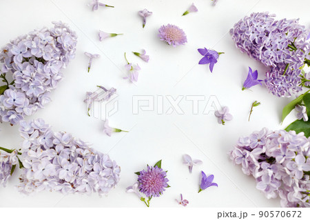 Lilac flower pattern background top view, flat lay. 90570672