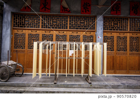 Street view local in Furong Ancient Town (Furong Zhen, Hibiscus Town), China. Furong Ancient Town is famous tourism attraction place. 90570820