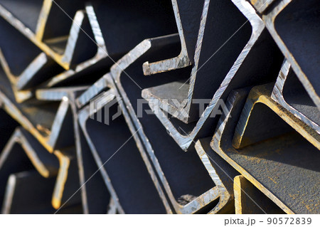 Metal profile channel in packs at the warehouse of metal products 90572839