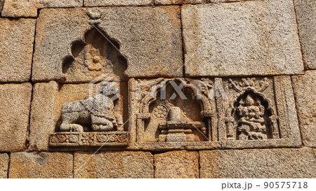 Carved sculpture of Shivalinga and Nandi on the wall of Chitradurga fort, Karnataka, India Carved sculpture of Shivalinga and Nandi on the wall of Chitradurga fort, Karnataka, India 90575718
