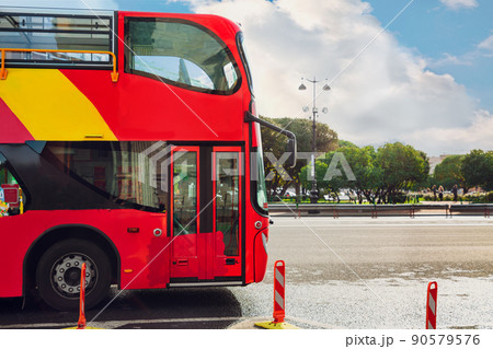 Red double decker bus. Sightseening tour. Excursion for tourists 90579576