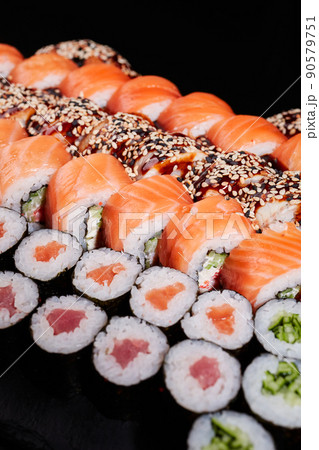 Close up of sushi set with lots of sushi rolls Philadelphia and maki rolls. 90579751