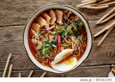 Bowl of asian ramen noodle soup 90581395