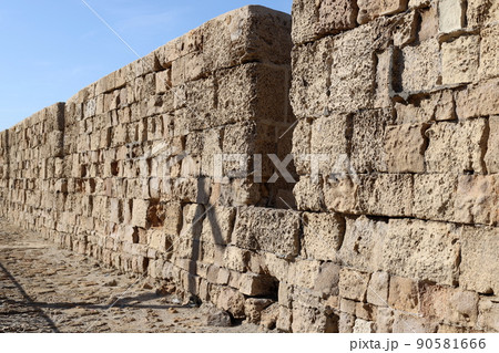 The wall of an ancient fortress in the old city of Akko in northern Israel The wall of an ancient fortress in the old city of Akko in northern Israel 90581666