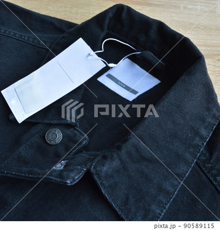 Black jeans denim coat jacket and blank sale tag paper Black jeans denim coat jacket and blank sale tag paper 90589115