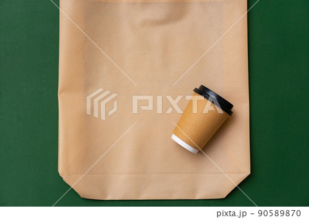 Textile shopping bag and coffee cup flat lay Textile shopping bag and coffee cup flat lay 90589870