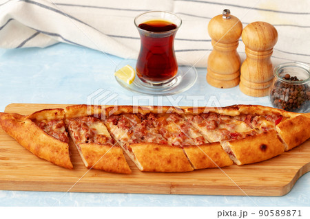 Close up of Turkish Pide bread on wooden table 90589871