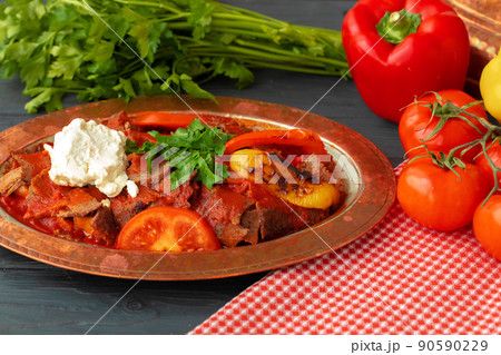 Turkish Meat Saute with vegetables in copper plate 90590229