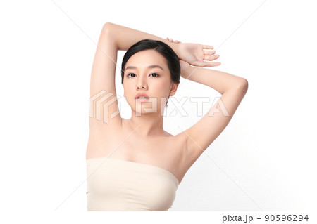Beautiful Young Asian woman lifting hands up to show off clean and hygienic armpits or underarms on white background, Smooth armpit cleanliness and protection concept Beautiful Young Asian woman lifting hands up to show off clean and hygienic armpits or underarms on white background, Smooth armpit cleanliness and protection concept 90596294