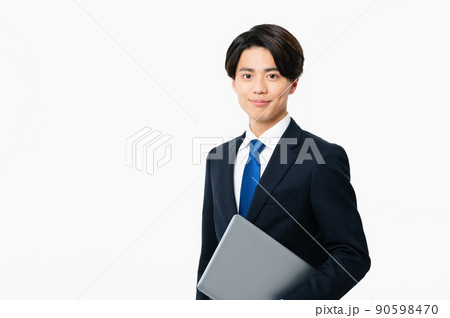 パソコンを持つ若いビジネスマン パソコンを持つ若いビジネスマン 90598470