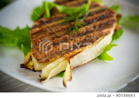 piece of grilled baked cabbage with spices in a plate piece of grilled baked cabbage with spices in a plate 90598665