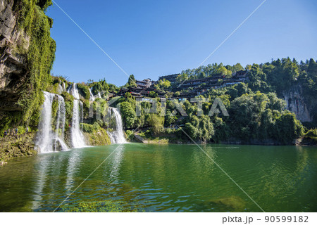 The Wangcun Waterfall at Furong Ancient Town. Amazing beautiful landscape scene of Furong Ancient Town (Furong Zhen, Hibiscus Town), China The Wangcun Waterfall at Furong Ancient Town. Amazing beautiful landscape scene of Furong Ancient Town (Furong Zhen, Hibiscus Town), China 90599182
