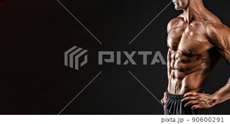 the very muscular handsome sexy guy on black background, naked torso the very muscular handsome sexy guy on black background, naked torso 90600291