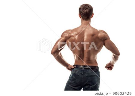 Strong Athletic Man Fitness Model posing back muscles, triceps over white background. Copy space Strong Athletic Man Fitness Model posing back muscles, triceps over white background. Copy space 90602429