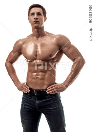 Muscular handsome young man with naked torso. Isolated on white background. Muscular handsome young man with naked torso. Isolated on white background. 90603986