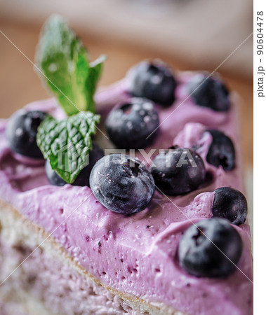 Closeup on slice of blueberry cake 90604478