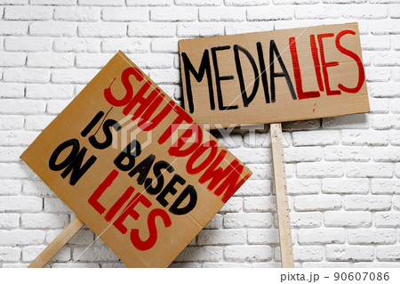Protest placard against fake news about outbreak 2019-nCoV and treatment 90607086