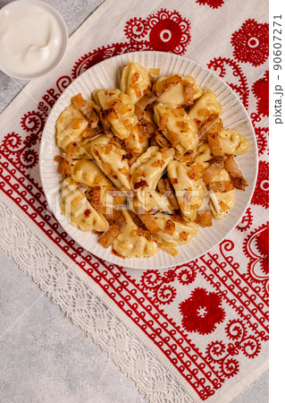 Dumplings, filled with mashed potatoes. 90607271