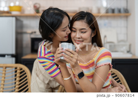 LGBT asian lesbian couple love moments happiness at home concept LGBT asian lesbian couple love moments happiness at home concept 90607814