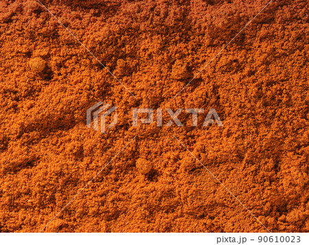 Background texture of chili pepper powder spice used as a spice in cooking. Background texture of chili pepper powder spice used as a spice in cooking. 90610023