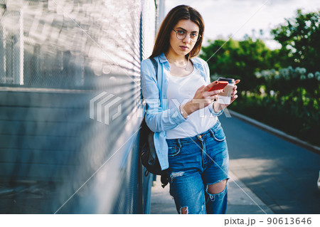 Caucasian hipster girl in spectacles posing 90613646